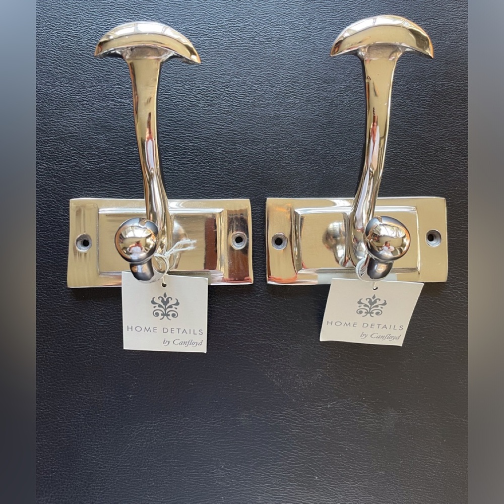 Pair of chrome coat hooks by Canfloyd